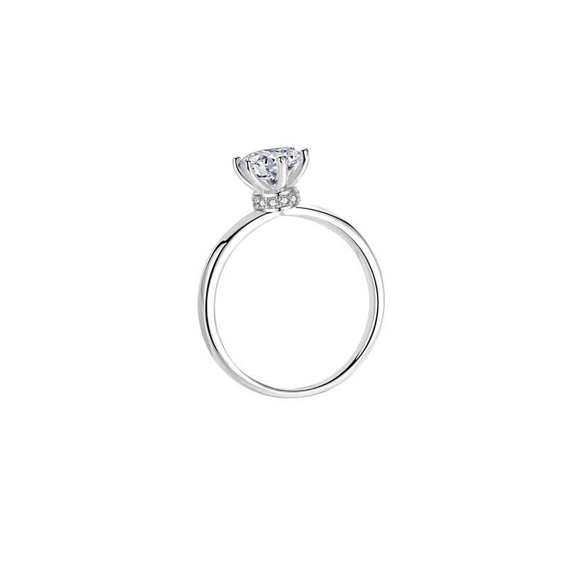 Anillo tradicional con diamante redondo (0.557 ct)