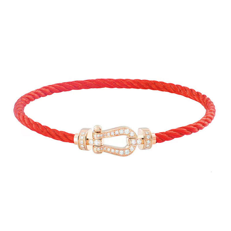 Pulso con charm con diamante (0.279 ct)