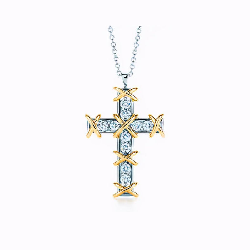 Cruz con diamante (0.316 ct)