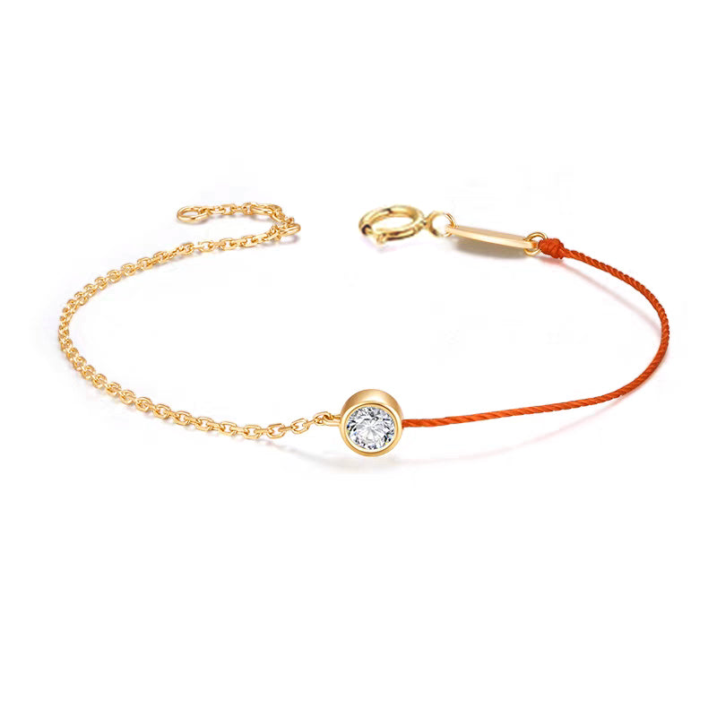 Pulso con charm con diamante (0.302 ct- 0.39 ct)