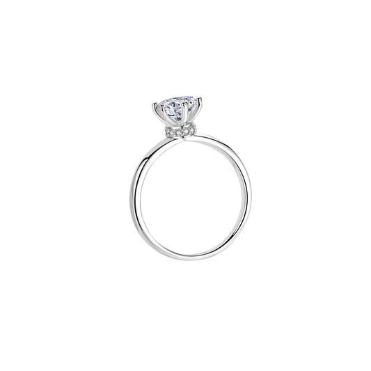 Anillo tradicional con diamante redondo (0.557 ct)