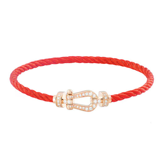 Pulso con charm con diamante (0.279 ct)