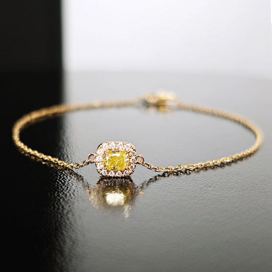 Pulso con charm con diamante (0.335 ct- 0.513 ct)
