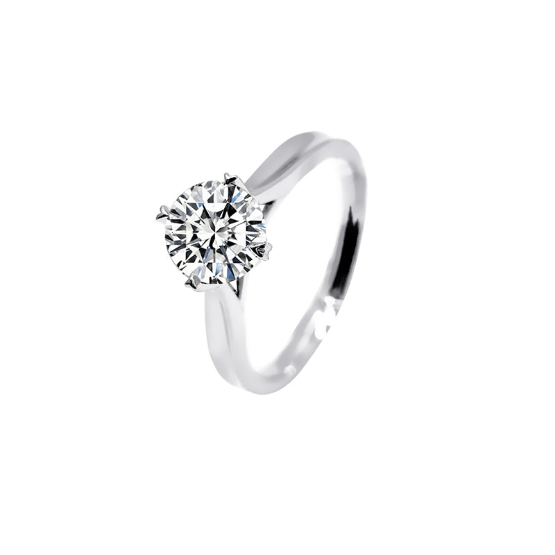 Anillo tradicional con diamante redondo (0.509 ct- 0.705 ct)