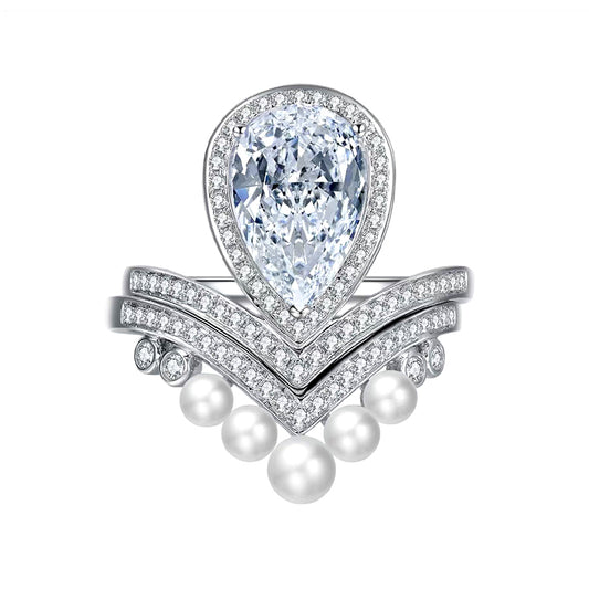 Anillo con diamante corte pera y perlas (1.688 ct)