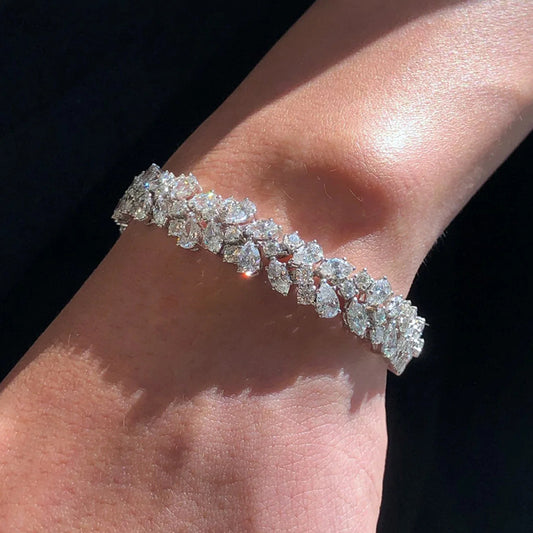 Pulso con charm con diamante (23.473 ct)