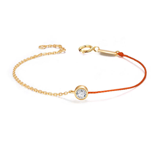Pulso con charm con diamante (0.302 ct- 0.39 ct)